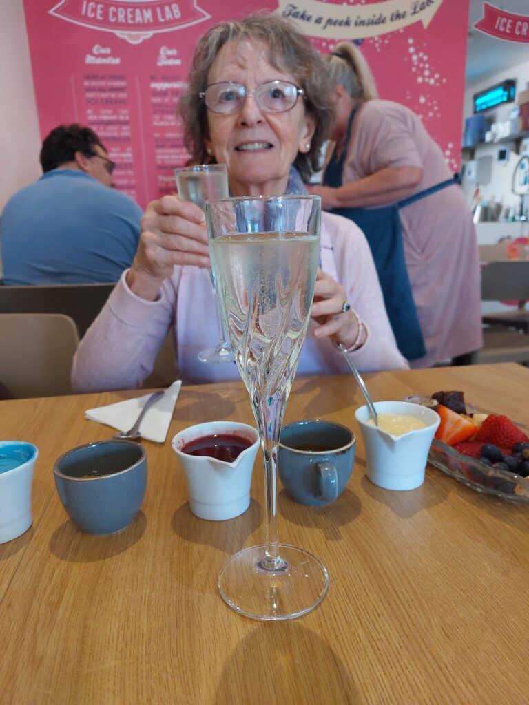 Pinks Parlour Sundae making workshop with my Nan holding a glass of prosecco